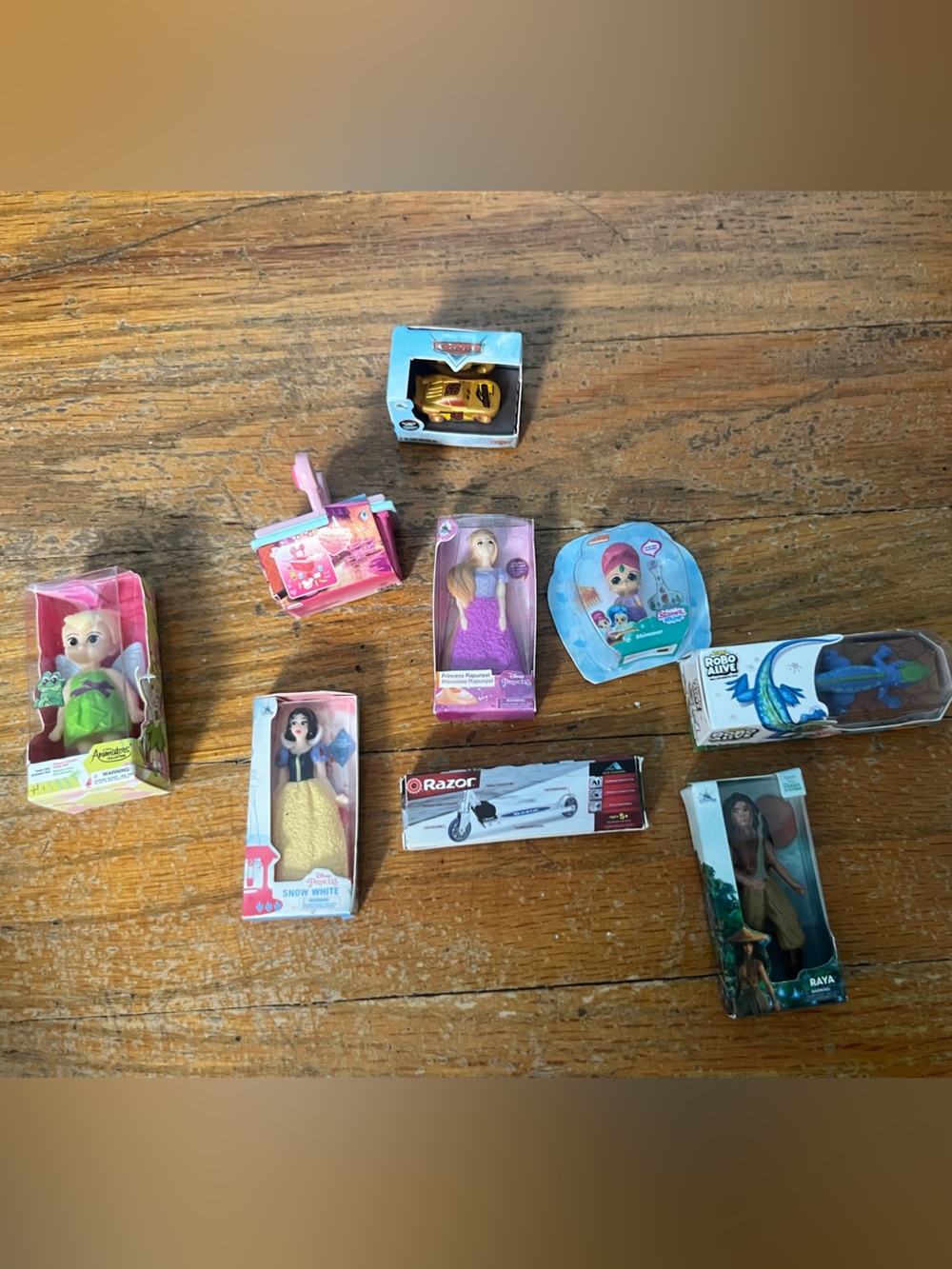 Set of 9 Mini Brands toys, including ultra rare Lightning McQueen